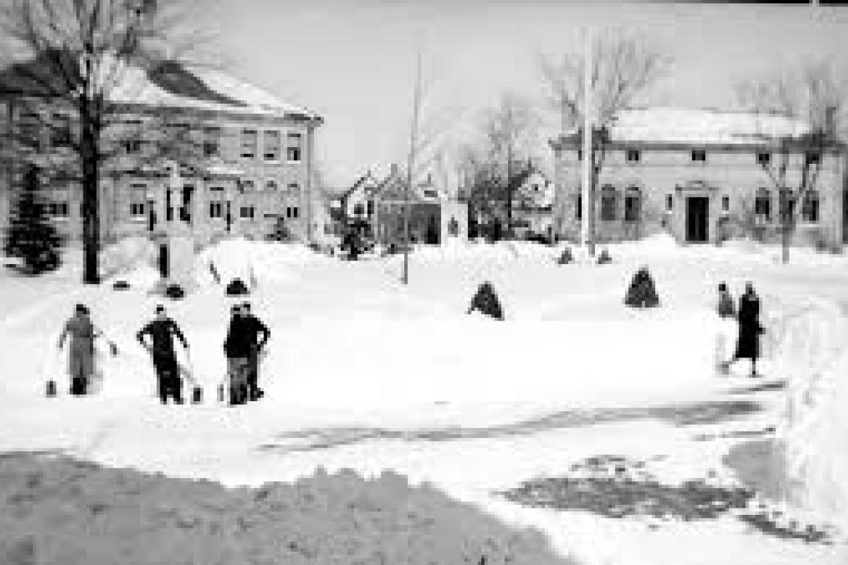Old photo of people shoveling snow