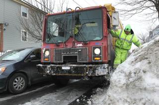 Garbage truck in the snow